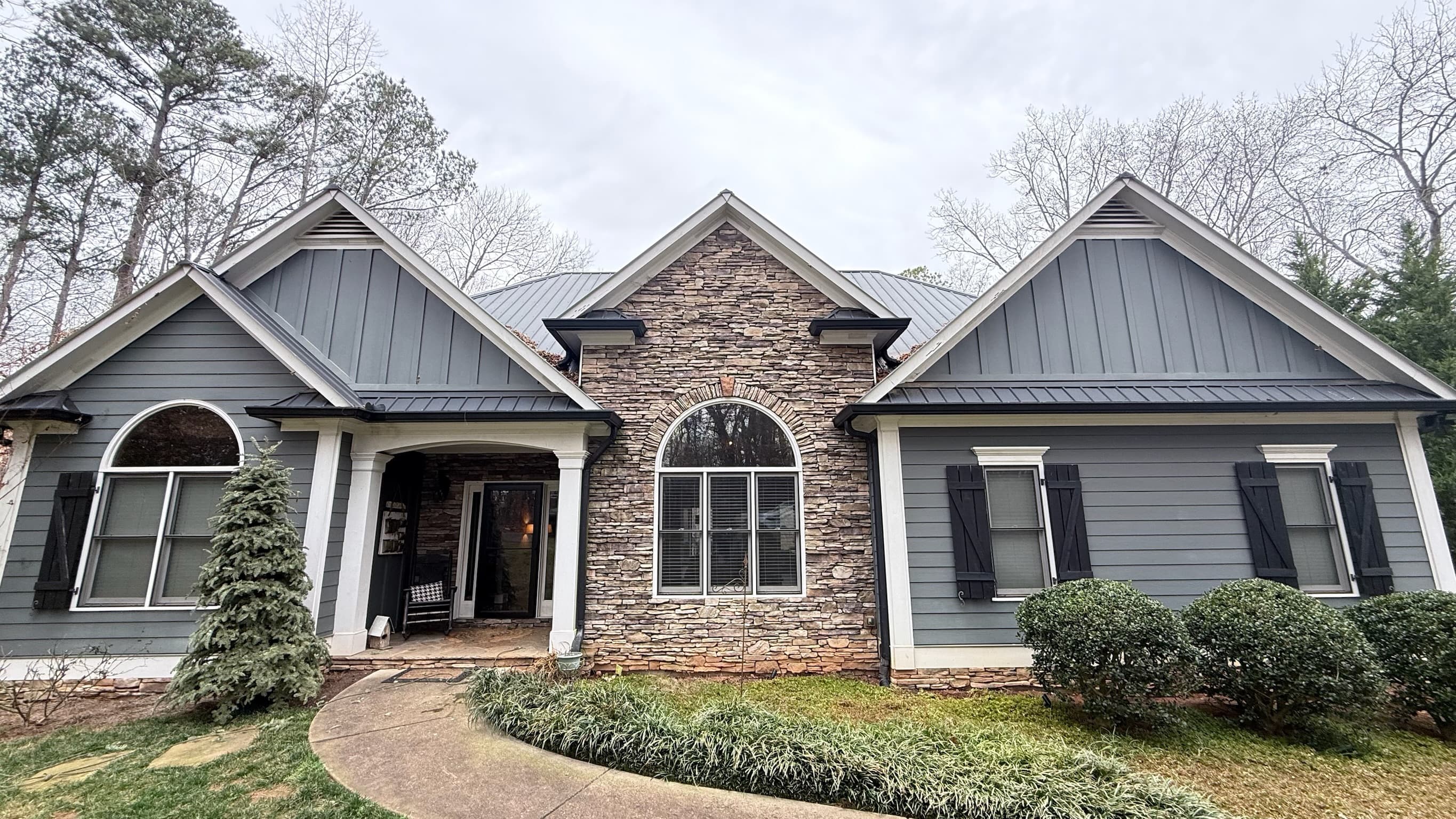 Residential home exterior with multiple gables